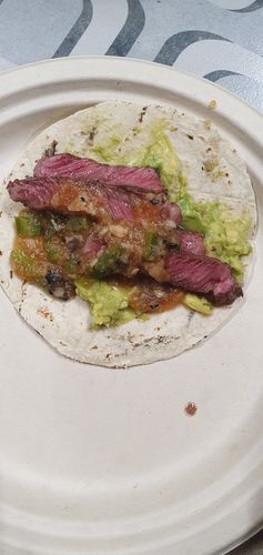 Reseña con foto de un cliente sobre Tablita de lomo