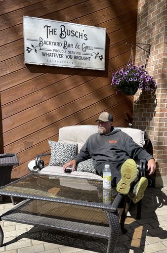 Customer photo review of Backyard Bar & Grill Sign