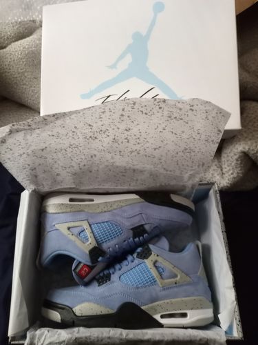 Customer photo review of Air Jordan 4 Retro 'University Blue' Pre Order