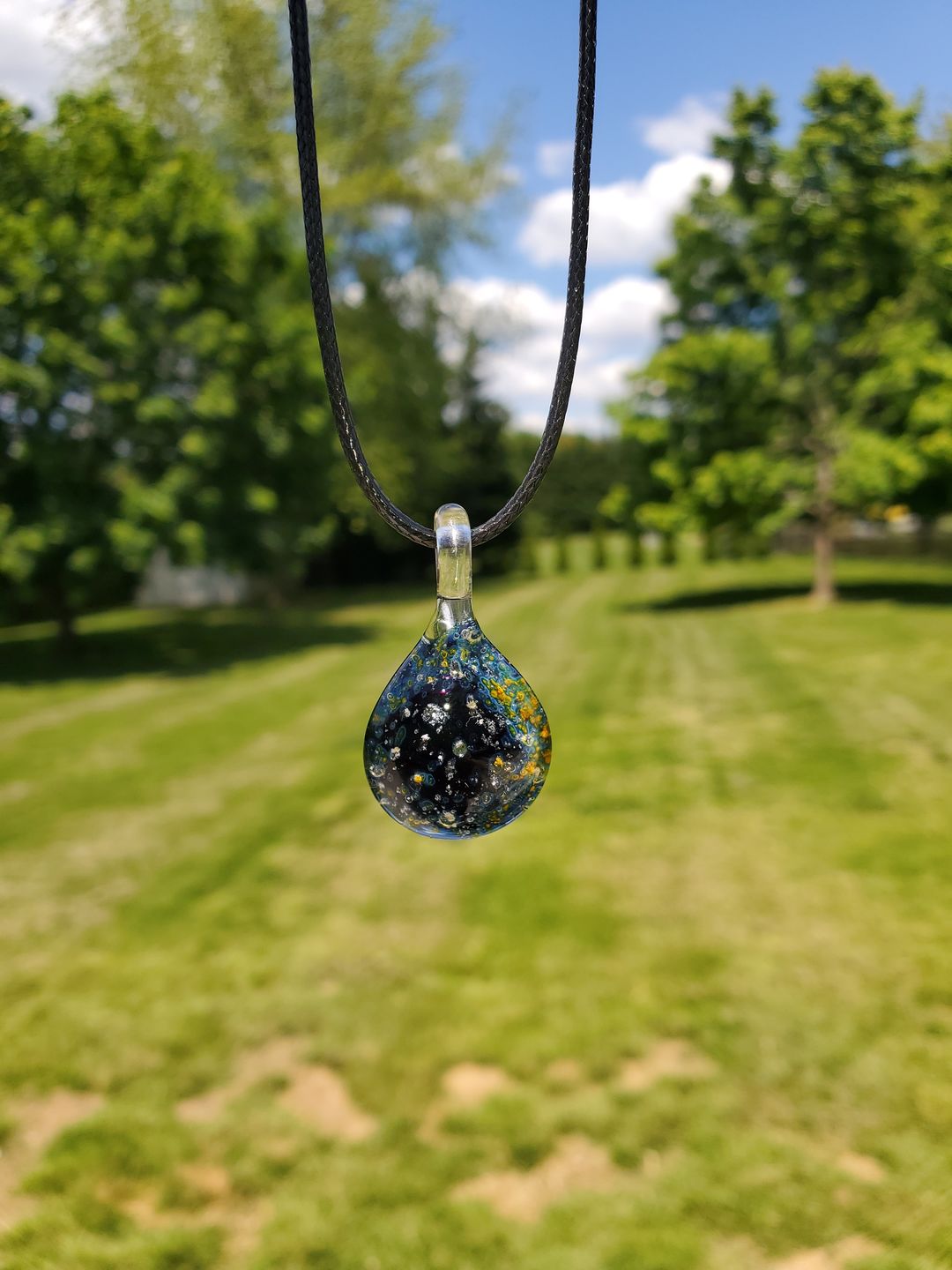Customer photo review of Starry Night Pendant with Infused Cremation Ashes