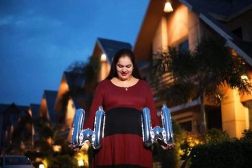 Customer photo review of Rich Maroon & Black Layer Maternity Dress