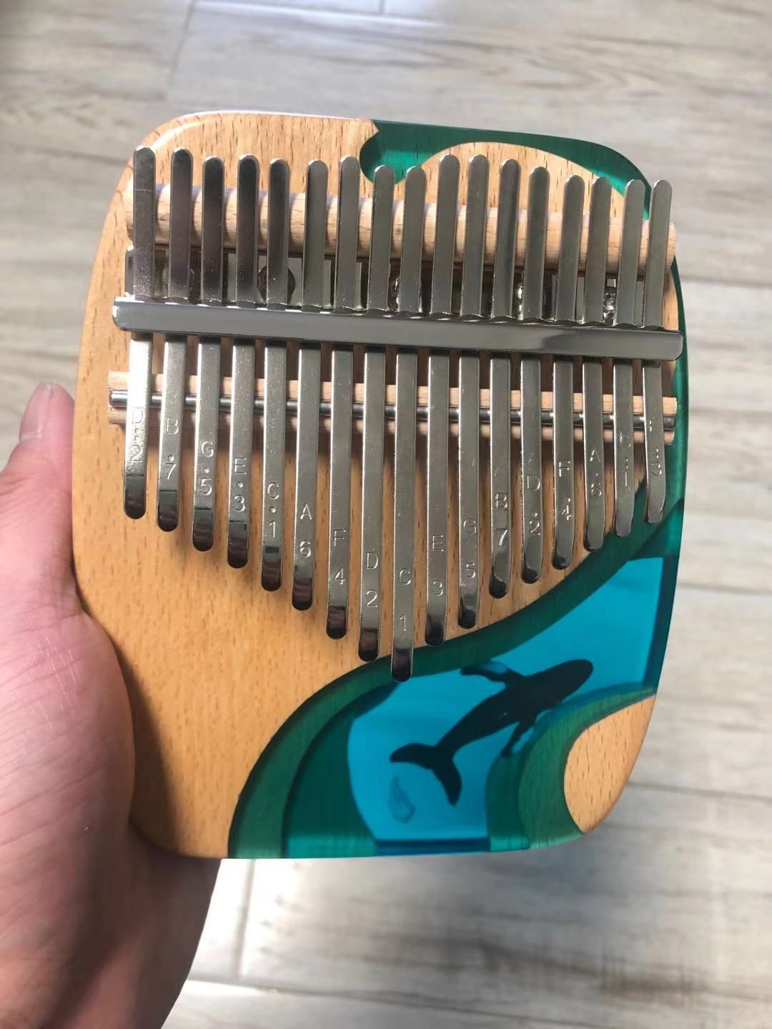 Customer photo review of 2021 New 17/21 Keys Hluru Blue Ocean Resin Whale Dolphin kalimba