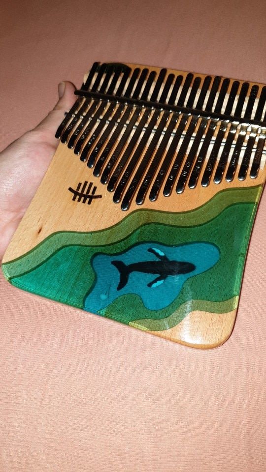 Customer photo review of 2021 New 17/21 Keys Hluru Blue Ocean Resin Whale Dolphin kalimba