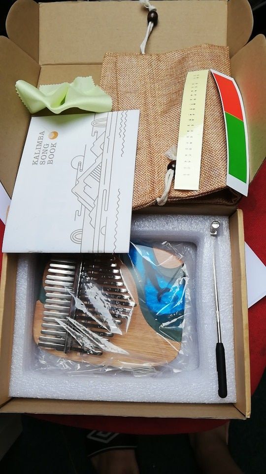 Customer photo review of 2021 New 17/21 Keys Hluru Blue Ocean Resin Whale Dolphin kalimba