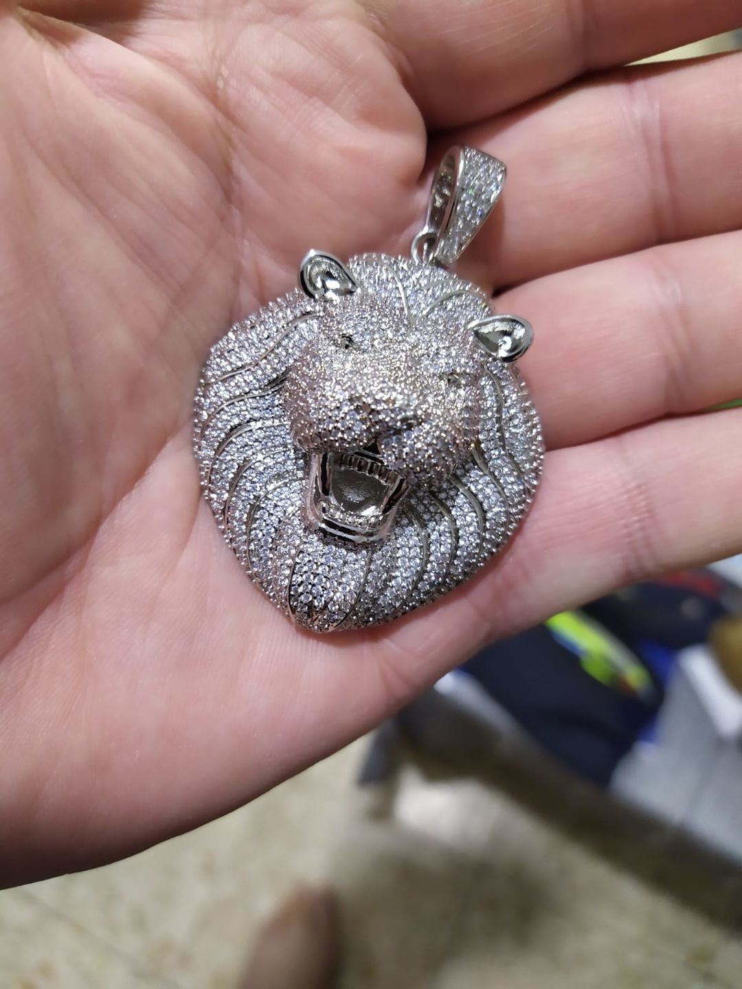 Customer photo review of Iced Out Lion Pendant