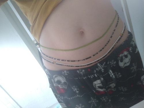 Customer photo review of Black Star Black and Gold Tie On Waist Beads