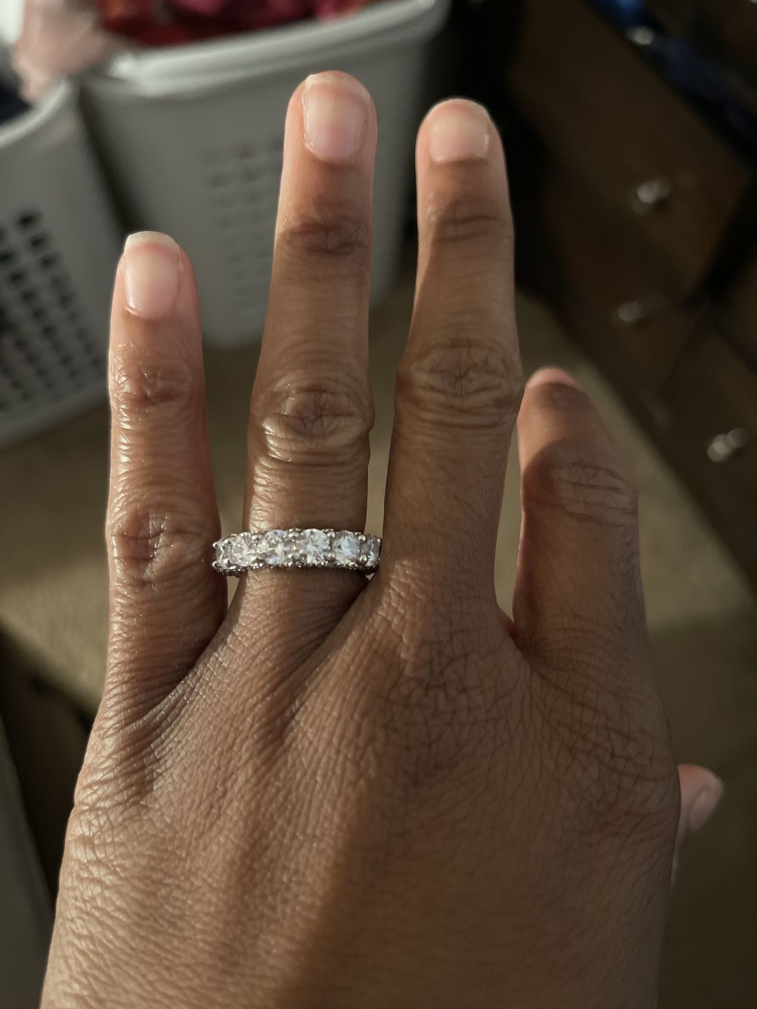 Customer photo review of Louily 5 Ct Luxury Eternity Round Cut Wedding Band In Sterling Silver