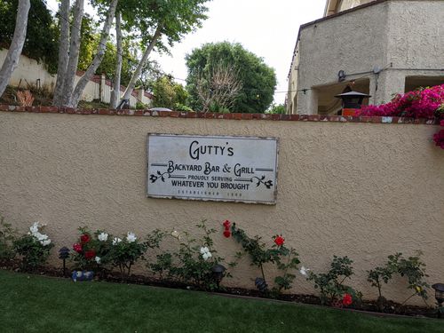 Customer photo review of Backyard Bar & Grill Sign
