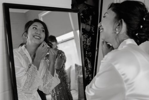 Customer photo review of Estela Pearl Drop Earrings with 4 Rositas