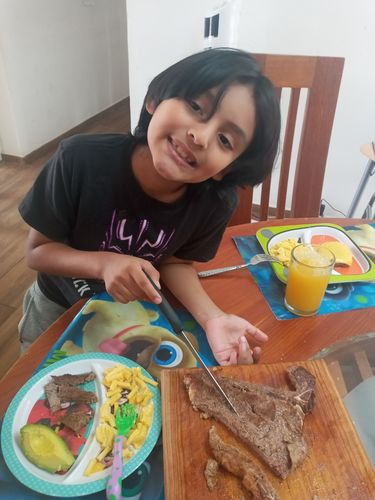 Reseña con foto de un cliente sobre T-Bone Steak