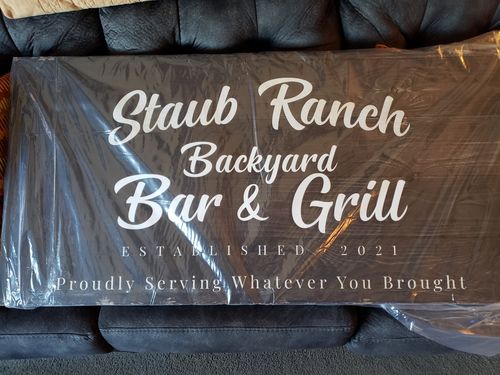 Customer photo review of Backyard Bar & Grill Sign