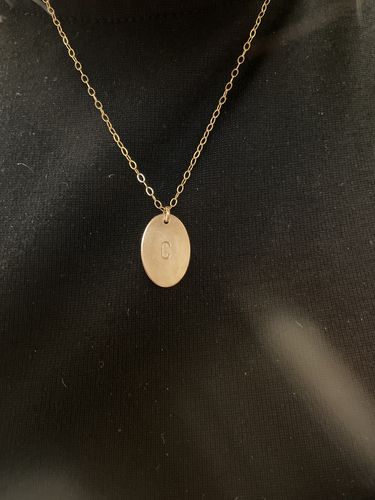 Customer photo review of Oval Stamped Initial Necklace