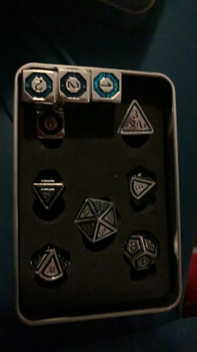 Customer photo review of CLERIC'S DOMAIN AQUA AND SILVER METAL DICE SET