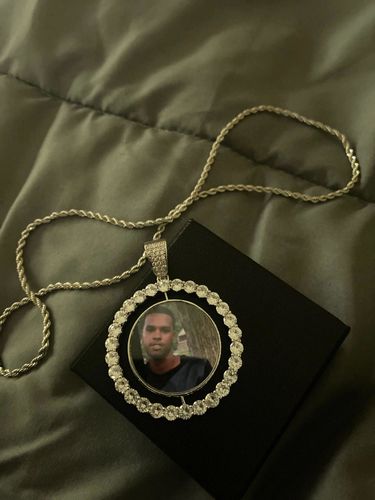 Customer photo review of THE ROTATING MEMORIES® - Custom Two-Faced Photo Pendant