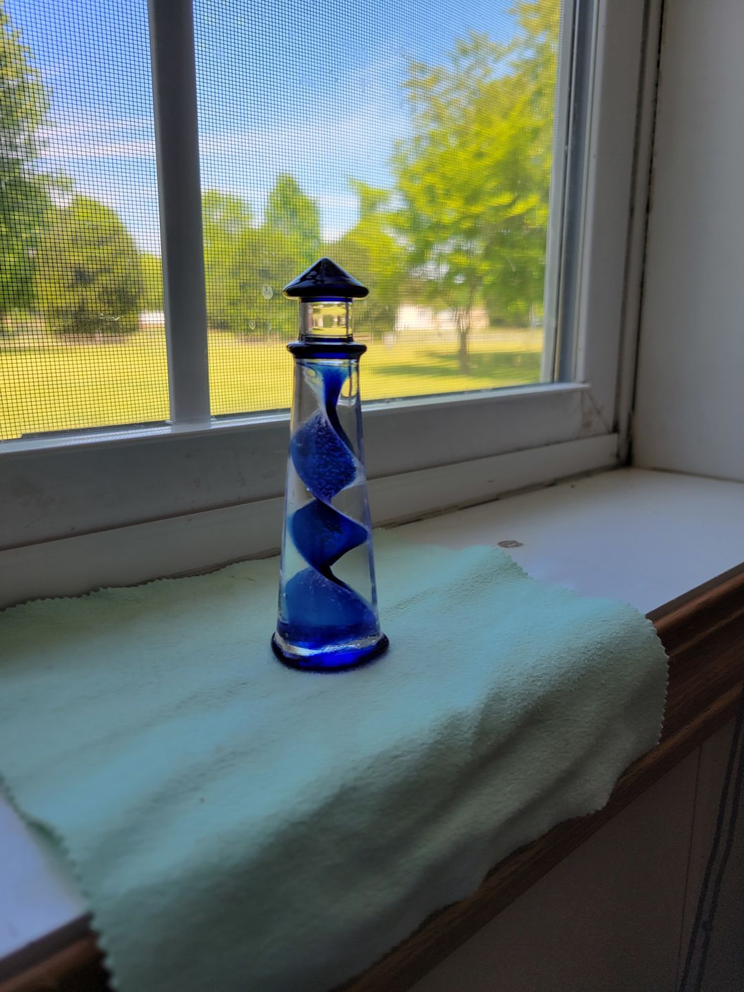 Customer photo review of Memorial Glass Lighthouse with Cremation Ashes