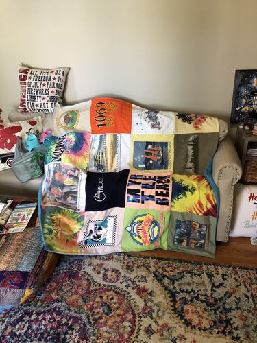 T-shirt quilt with beer, cultural events themes by Lisa  from NC