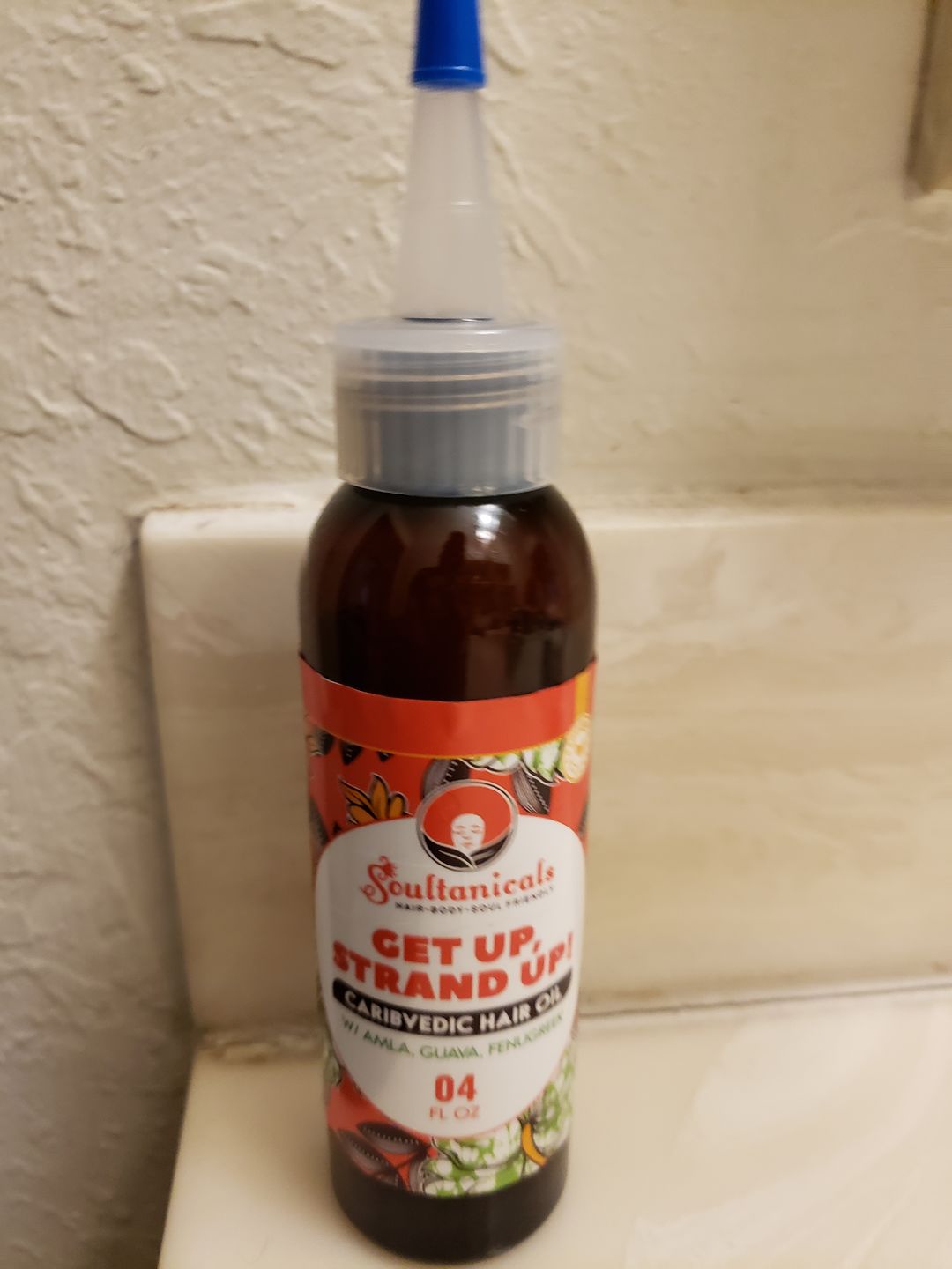 Customer photo review of Get Up, Strand Up! Caribvedic Hair Oil