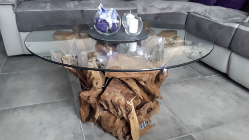 Customer photo review of Wurzelholz Couchtisch IKAL Tisch ink.Glasplatte Ø 80cm