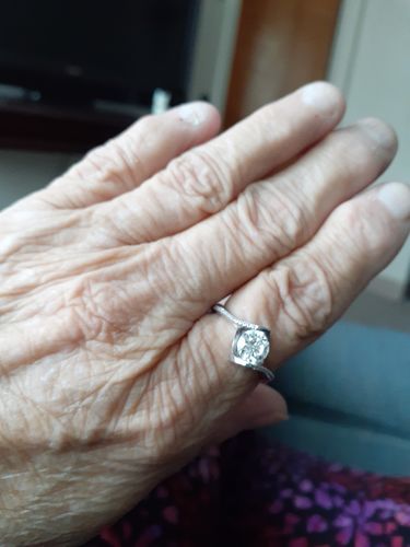 Customer photo review of Angel kiss Round Moissanite Sterling Silver Ring