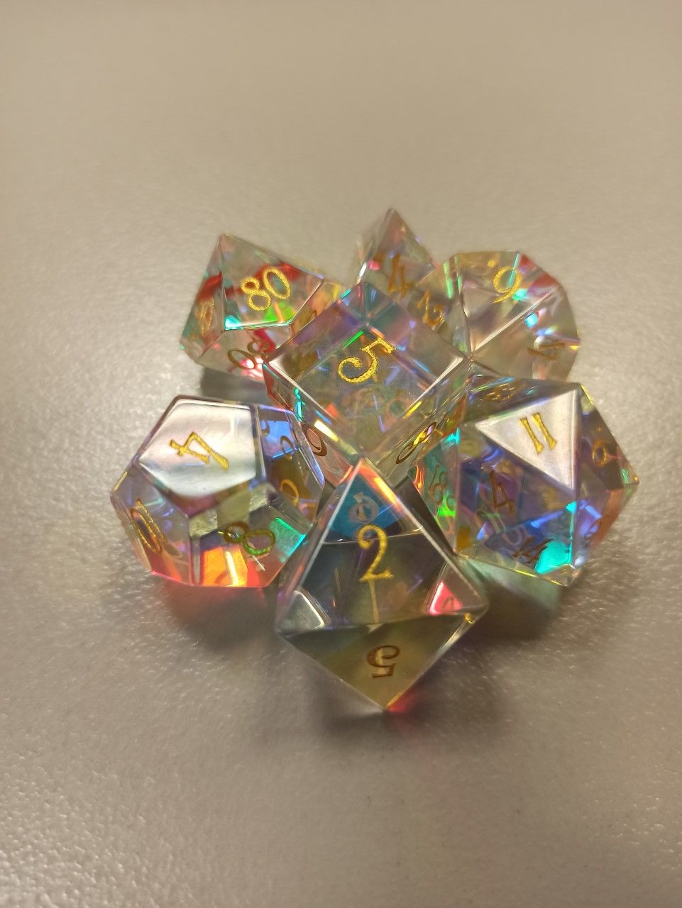 Customer photo review of URWizards D&D Dichroic Prism Glass Gemstone Engraved Dice Set