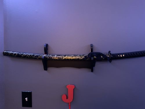 Customer photo review of Handmade Japanese Swords Samurai Katana Real Sword Spring Steel Black Blade Full Tang