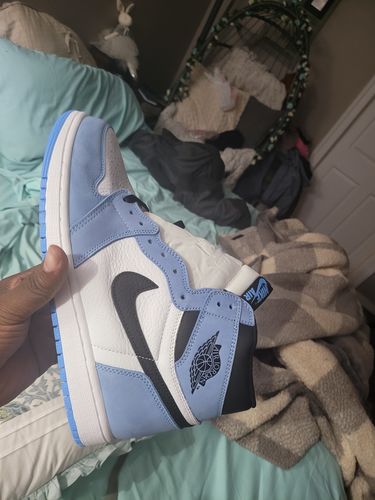 Customer photo review of Air Jordan 1 High University Blue
