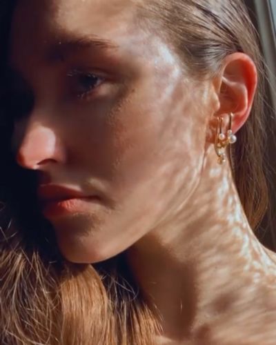 Customer photo review of CORDELIA Modern Double Pearl Curved Earrings