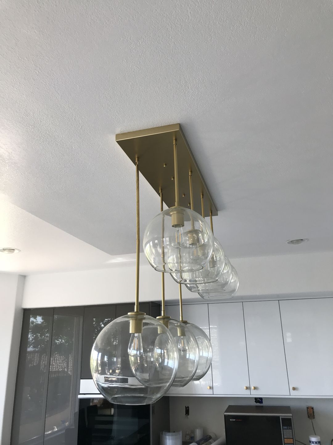 Customer photo review of Modern 7-Light Sculptural Glass Globe Pendant Chandelier