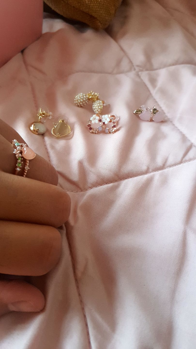 Customer photo review of Aretes de Saturno de Ópalo