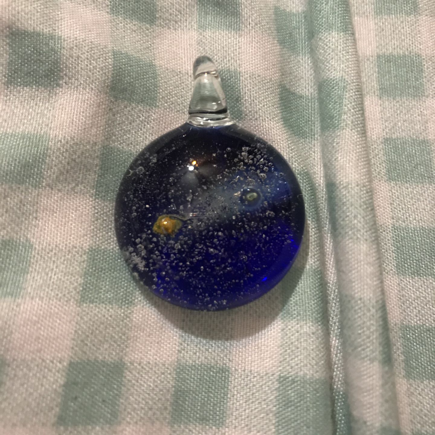 Customer photo review of Halley's Comet Glass Pendant