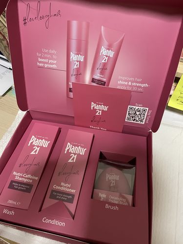 Customer photo review of Plantur 21 #longhair Nutri-Caffeine Shampoo and Conditioner Set [Free Detangler Brush worth $14.9)