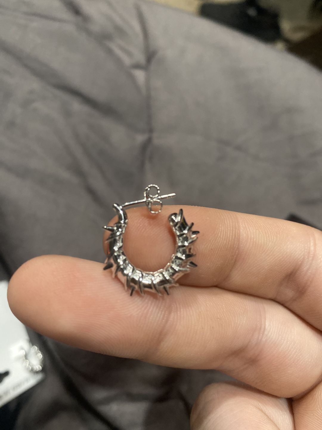 Customer photo review of ARMORED OPEN HOOP EARRING