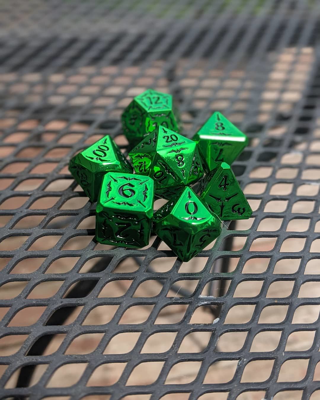 Customer photo review of SWORD OF THE EMERALD ISLES METAL DICE SET