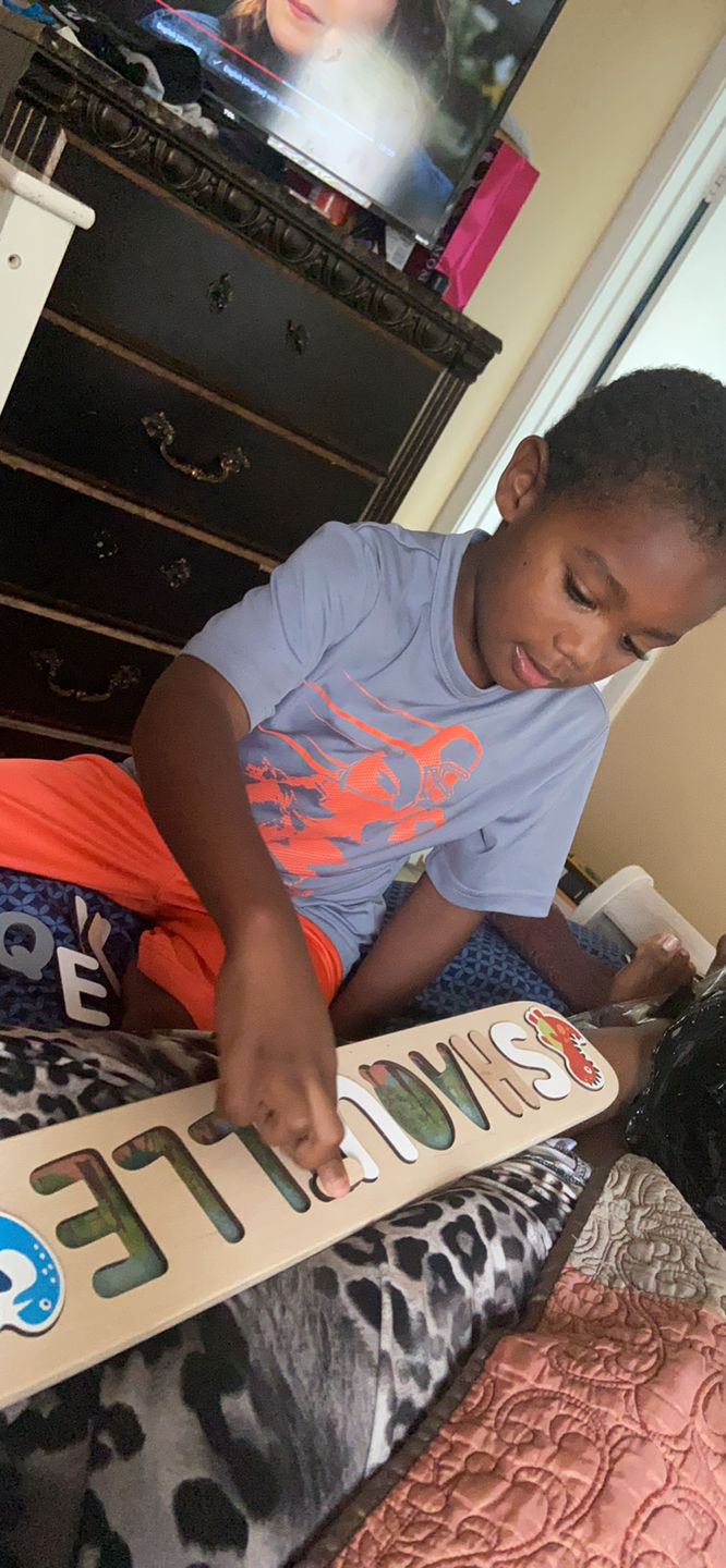 Customer photo review of Boy Dinosaur Name Puzzle