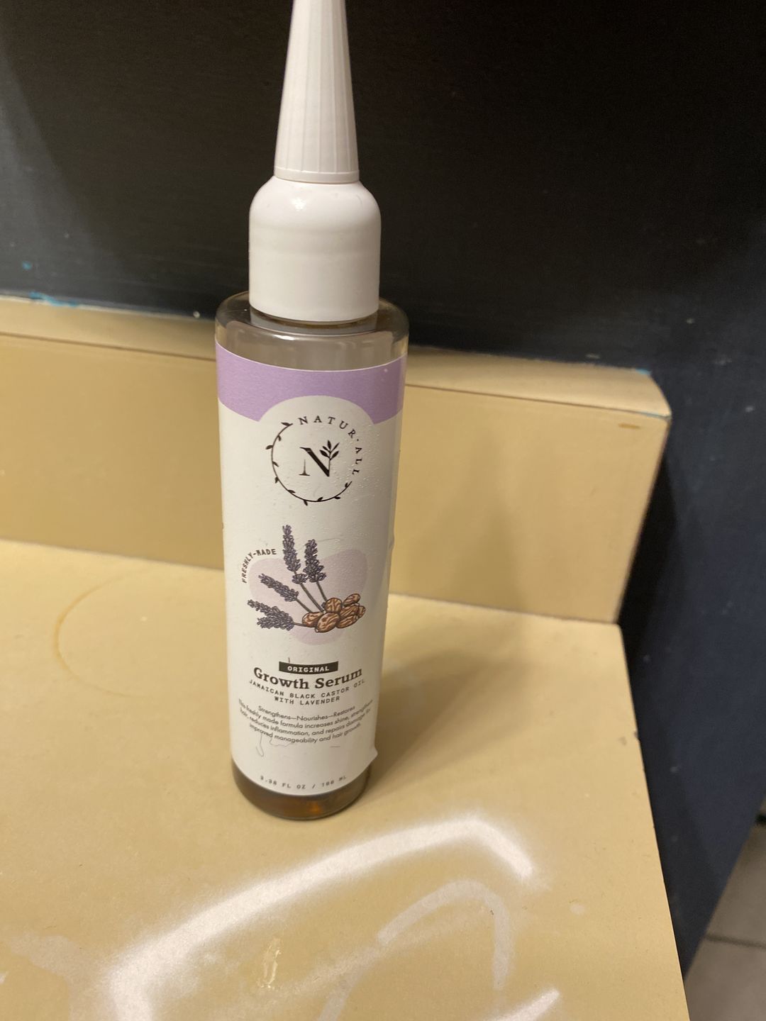 Customer photo review of Original Jamaican Black Castor Oil Growth Serum