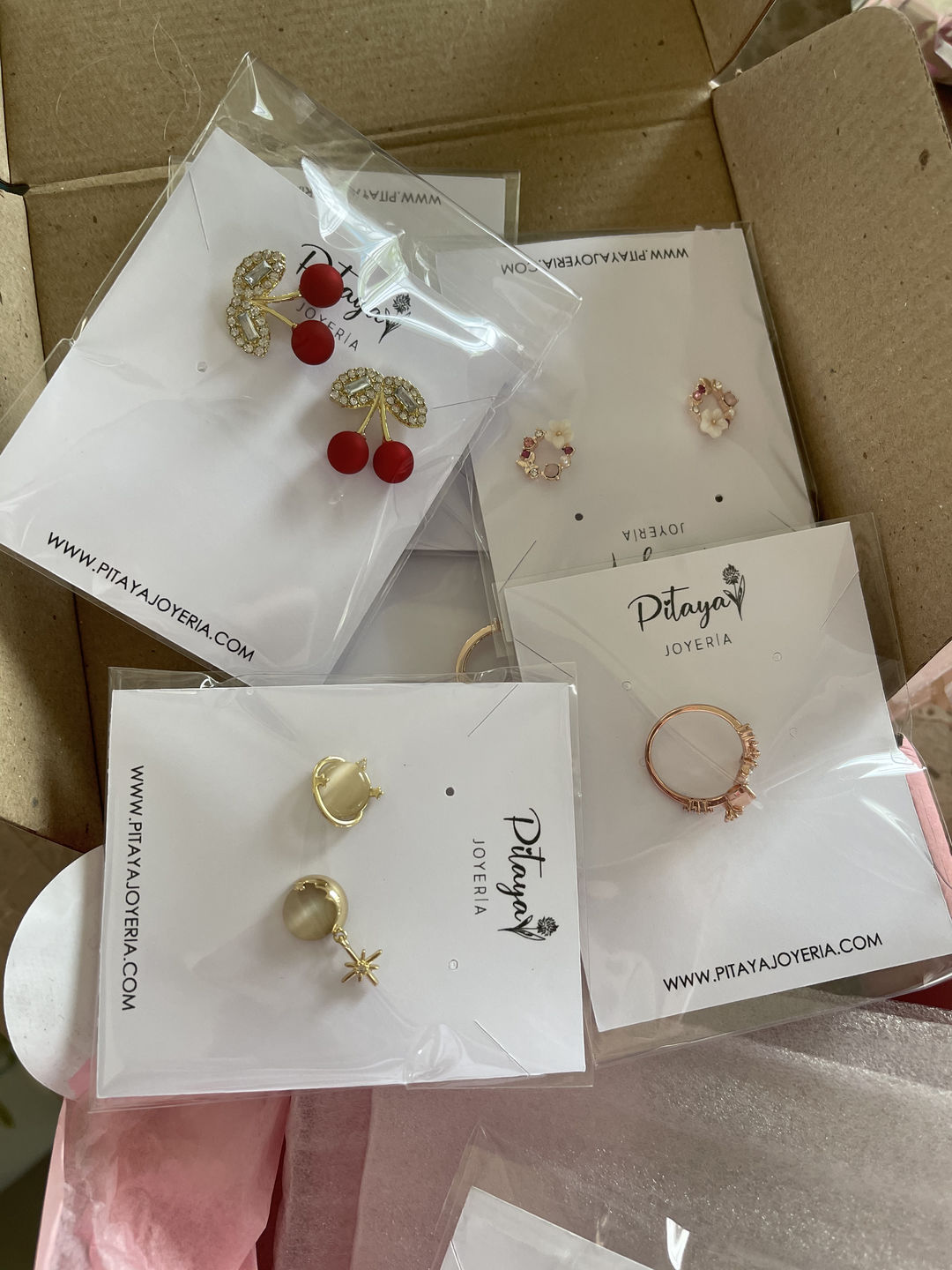 Customer photo review of Aretes de Saturno de Ópalo