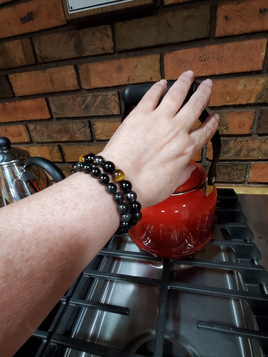 Customer photo review of Anti-stress Rainbow Obsidian Bracelet