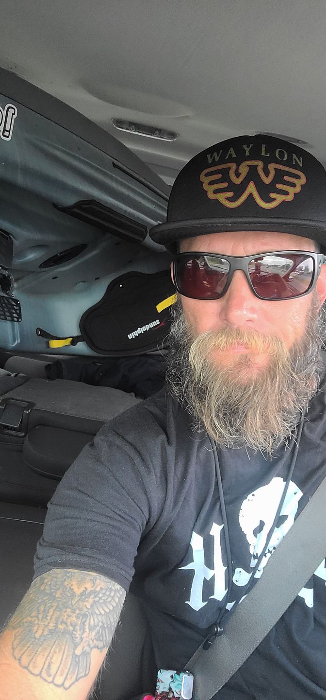 Customer photo review of Waylon Jennings Distressed Flying W Trucker Hat - Black