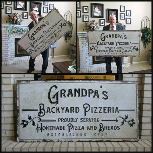 Customer photo review of Backyard Bar & Grill Sign