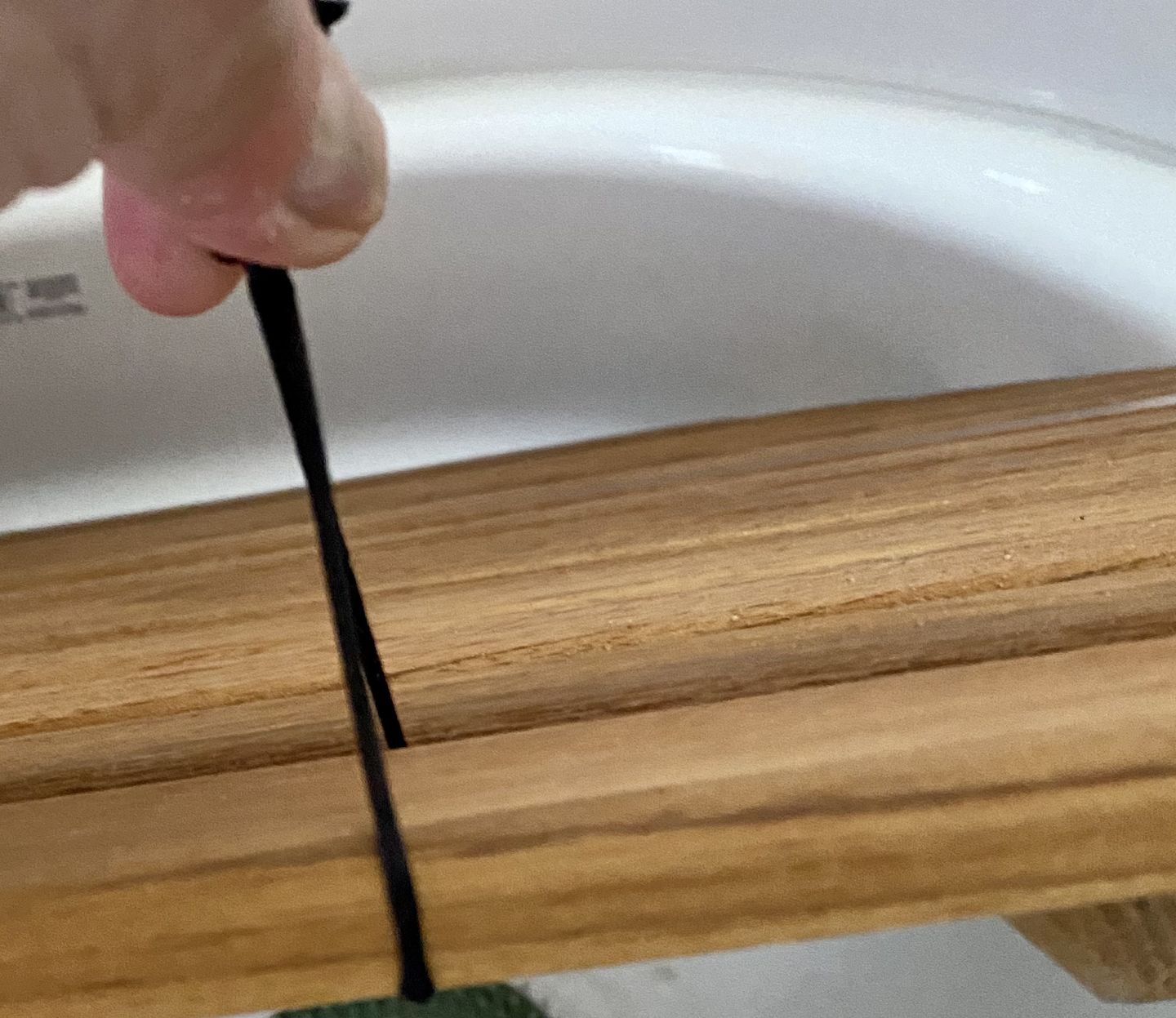 Customer photo review of Corner Bath Airstream Teak Shower Mat (2021 and later)