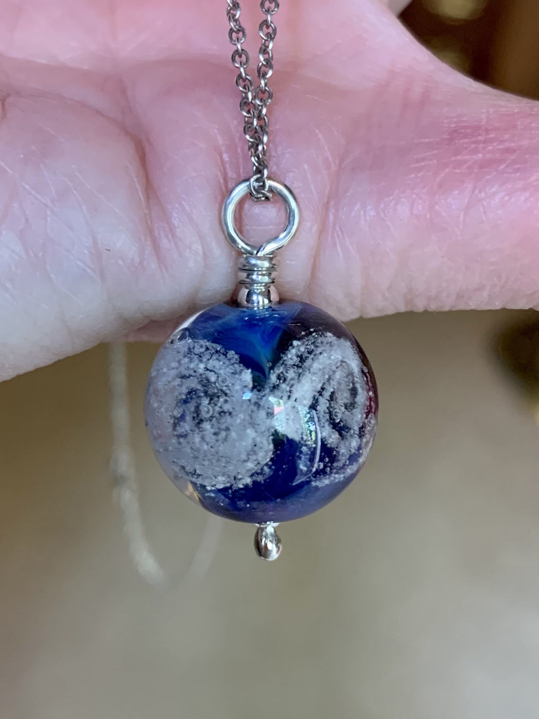 Customer photo review of Cosmic Swirl Memorial Pendant