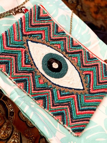 Customer photo review of Evil Eye Good Luck Clutch with Removable Crossbody Chain