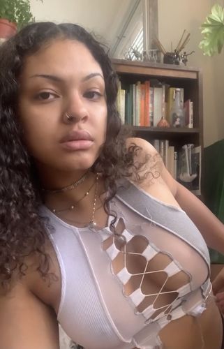 Customer photo review of Sleeveless sheer lace up crop top