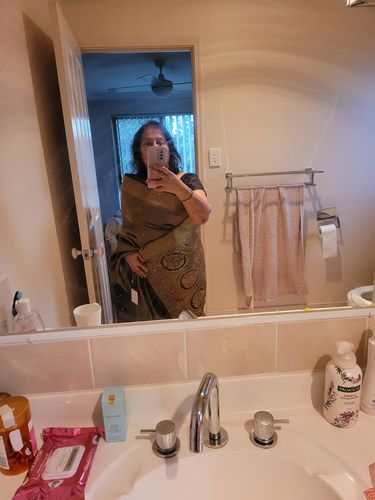 Customer photo review of FAIRYTALE PINK WOVEN BANARASI TUSSAR SILK SAREE WITH BROCADE BLOUSE