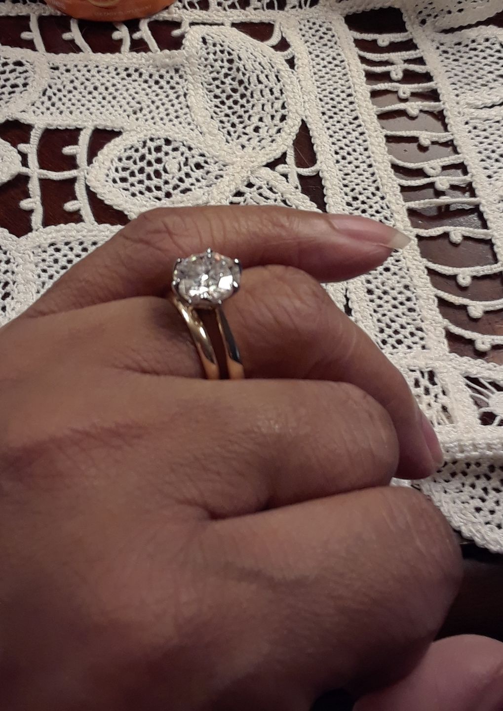 Customer photo review of Doveggs round flower shape solitaire moissanite engagement ring