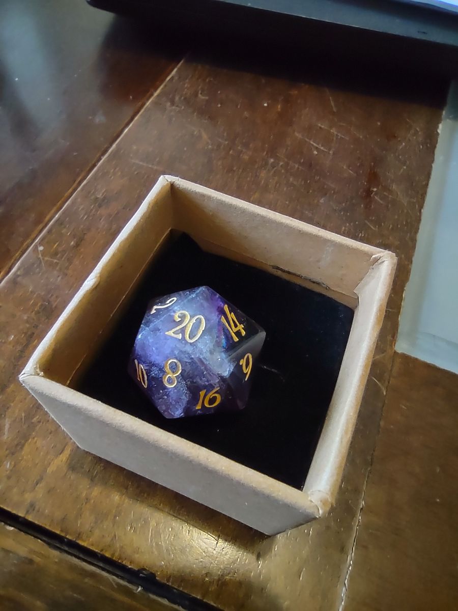 Customer photo review of URWizards D20 Engraved Purple Fluorite Gemstone D20 Dice - Dungeons and Dragons D20, RPG Game DND