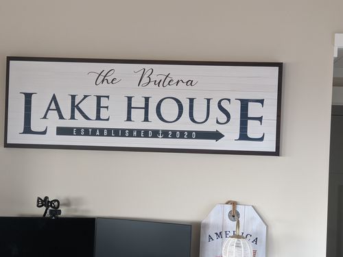 Customer photo review of Family Lake House Arrow Sign