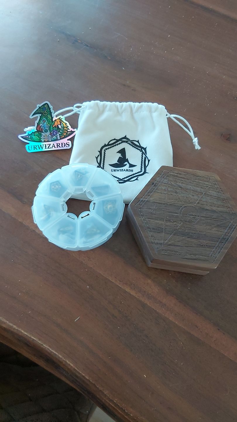 Customer photo review of URWizards D&D Rose Quartz Gemstone Engraved Dice Set Plant Vine Style