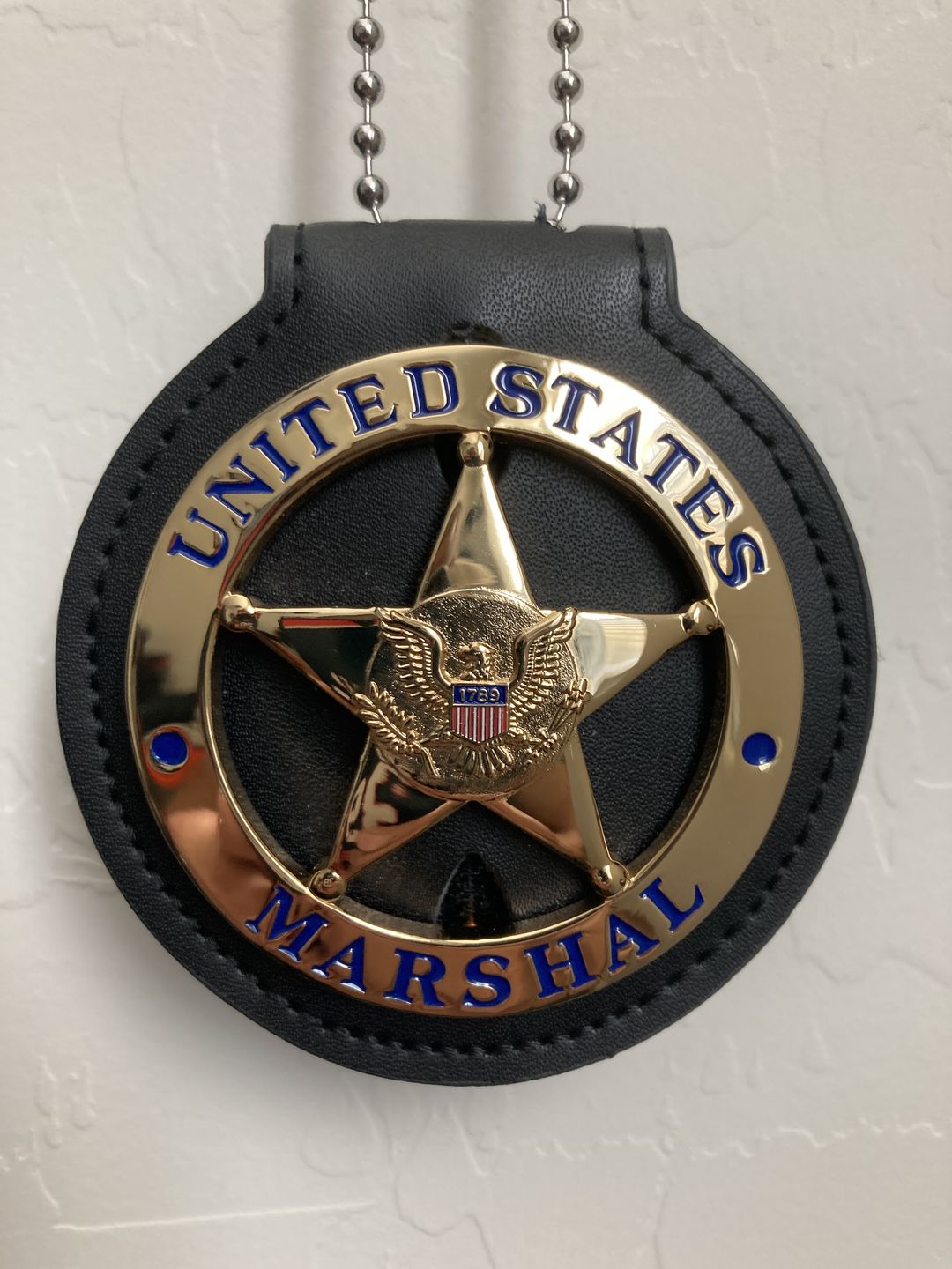 Customer photo review of US Federal Court Law Enforcement Marshal Gold Badge Replica Movie Props