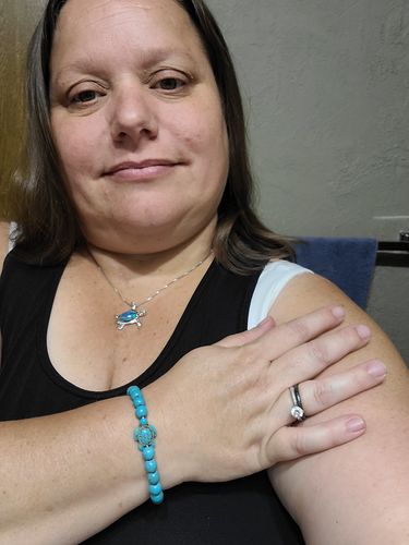 Customer photo review of Save a Turtle Necklace